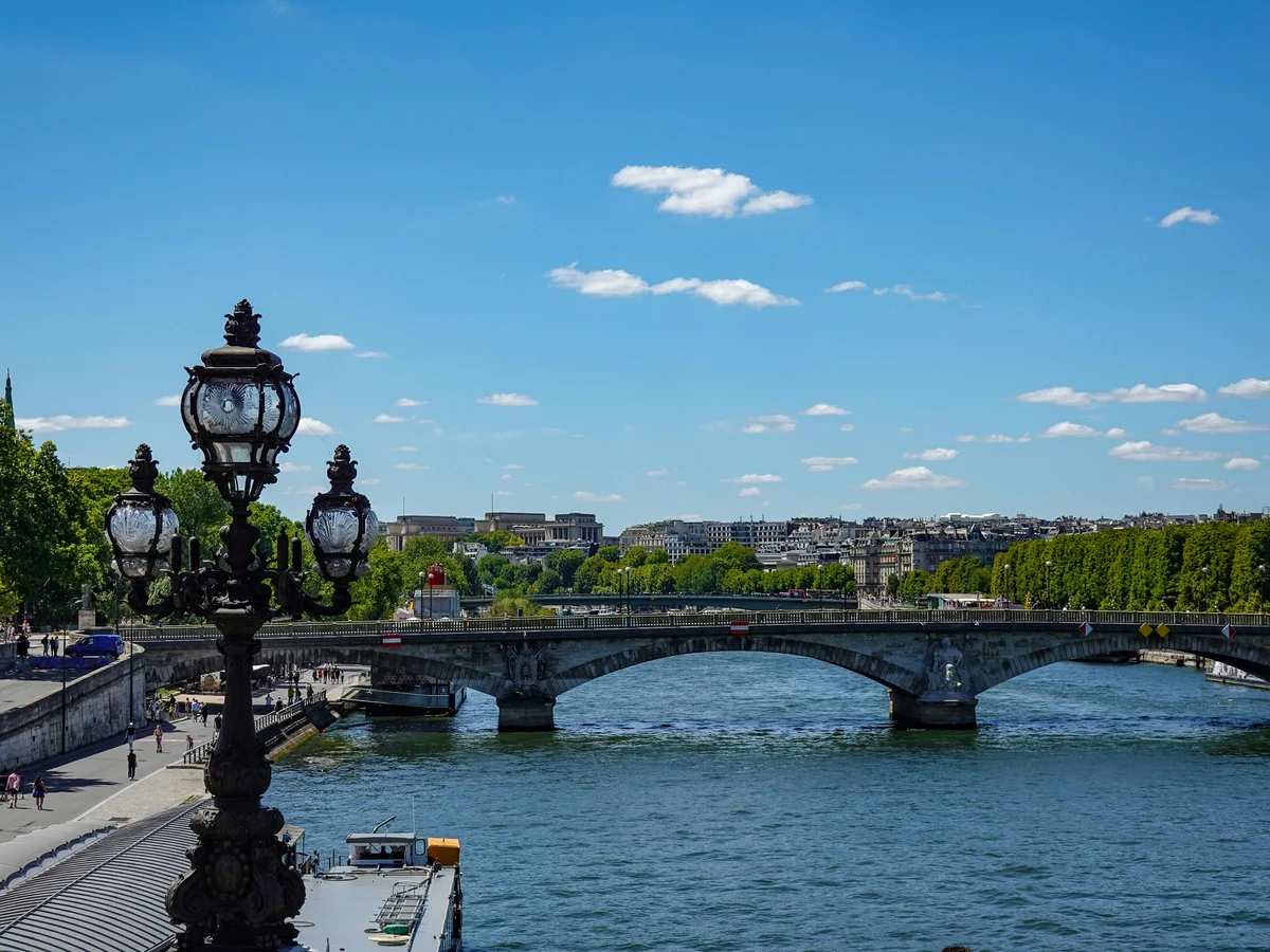 Concrete Bridge on Body of Water Under Blue Sky, Paris, France