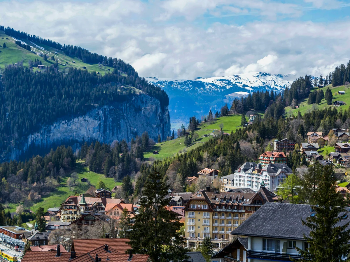Modern cottage village placed in mountains, Switzerland