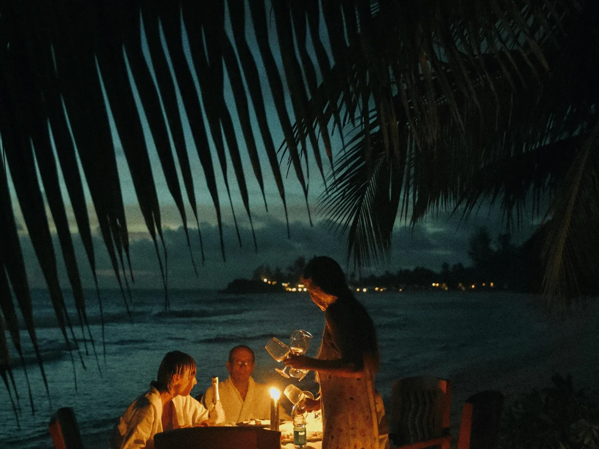 People Dining at the Beach