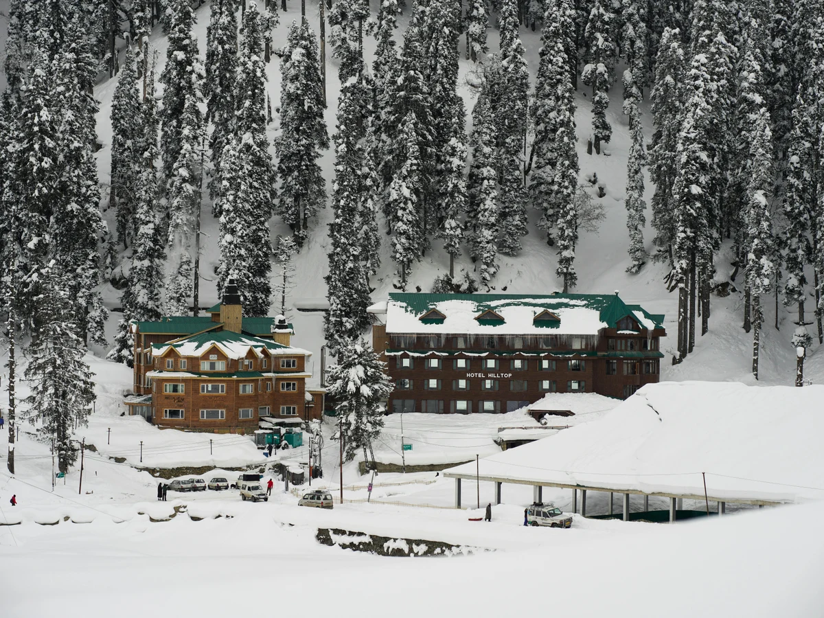 Snow Covered Property by the Mountains