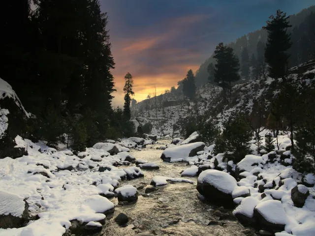 Winter Sunset Over Snowy Kashmir Landscape