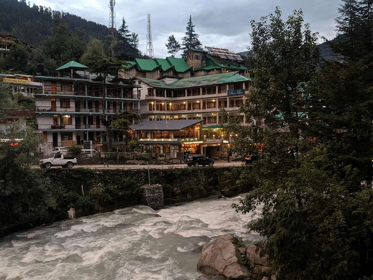 River and Hotel in Mountains