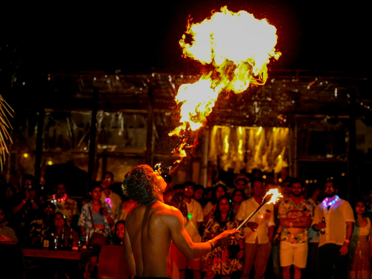 Fire Performer Entertains Night Party Crowd