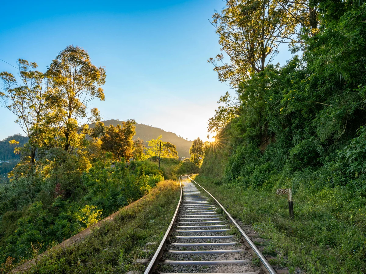 Scenic Sunrise Over Sri Lankan Railway Tracks