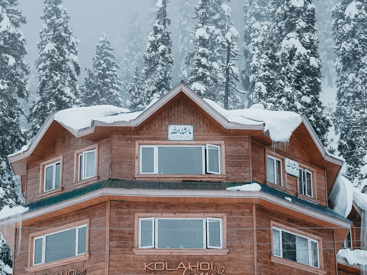 Hotel in Snow in Winter Mountains