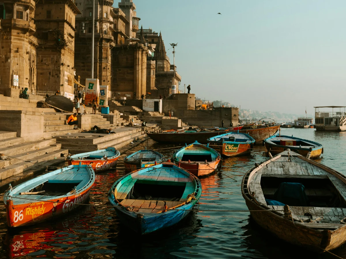 Boats on the Ganges River and a Hindu Temple