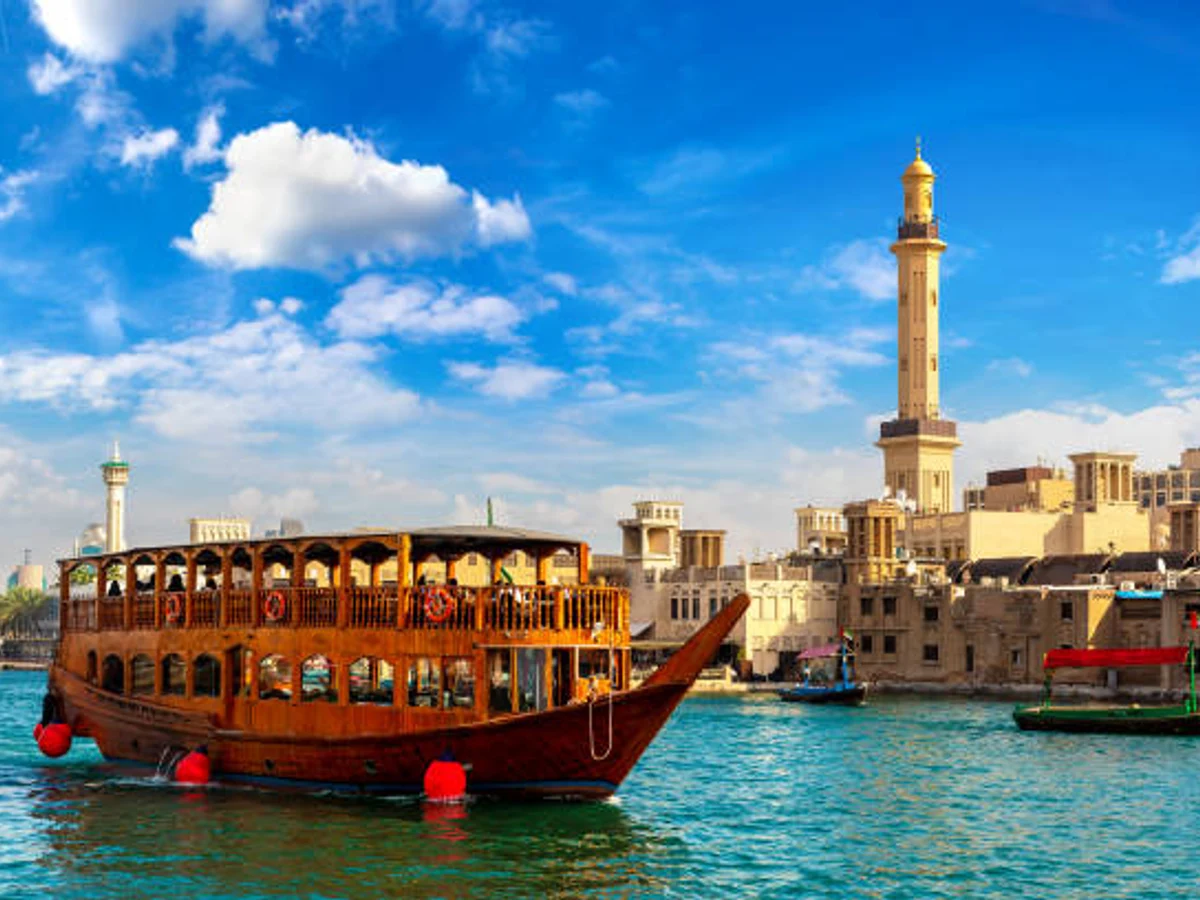 Old traditional wooden ship on the bay Creek in Dubai, United Arab Emirates